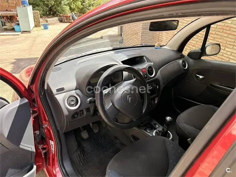 Usado Citroën C3 61 CV (44 kW) 2006 Rojo Berlina