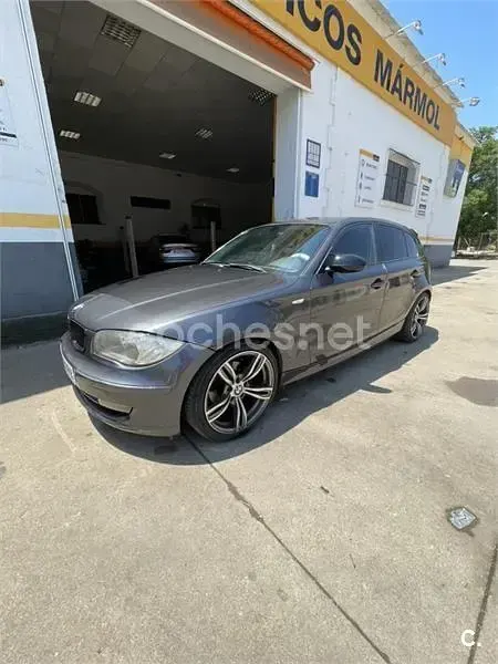 Usado BMW 118 122 CV (89 kW) 2007 Negro Utilitario