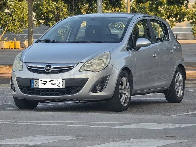 Usado Opel Corsa Selective 85 CV (62 kW) 2012 Gris / plata Utilitario
