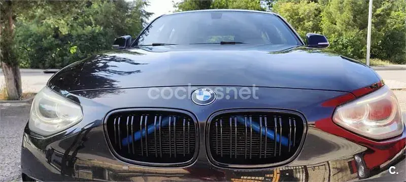 Usado BMW 118 Sport Line 143 CV (105 kW) 2012 Negro Utilitario