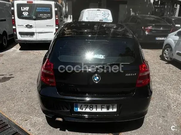 Usado BMW 118 122 CV (89 kW) 2007 Negro Utilitario