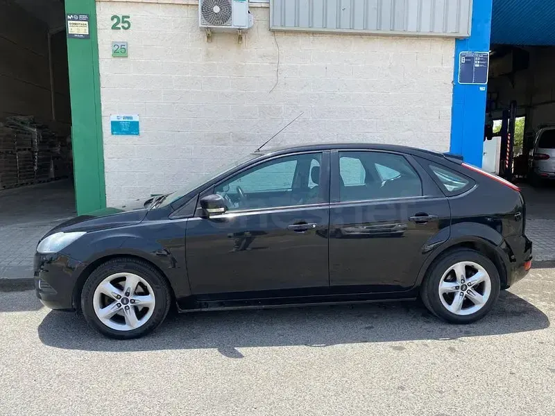 Usado Ford Focus Titanium 90 CV (66 kW) 2009 Negro Berlina