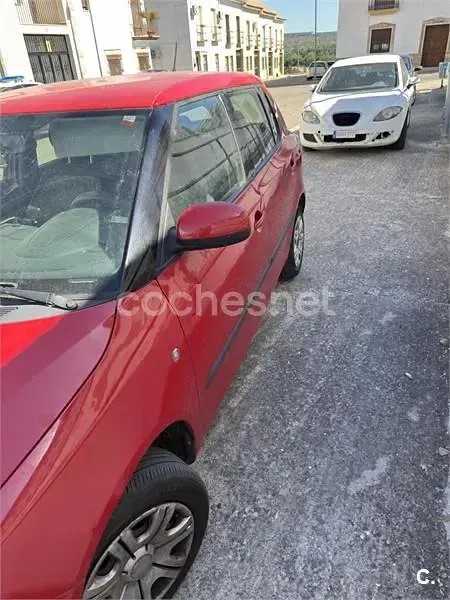 Usado Skoda Fabia 60 CV (44 kW) 2010 Rojo Berlina