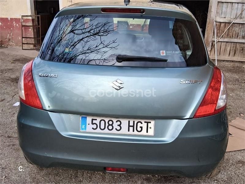 Usado Suzuki Swift GL 95 CV (69 kW) 2011 Gris / plata Utilitario
