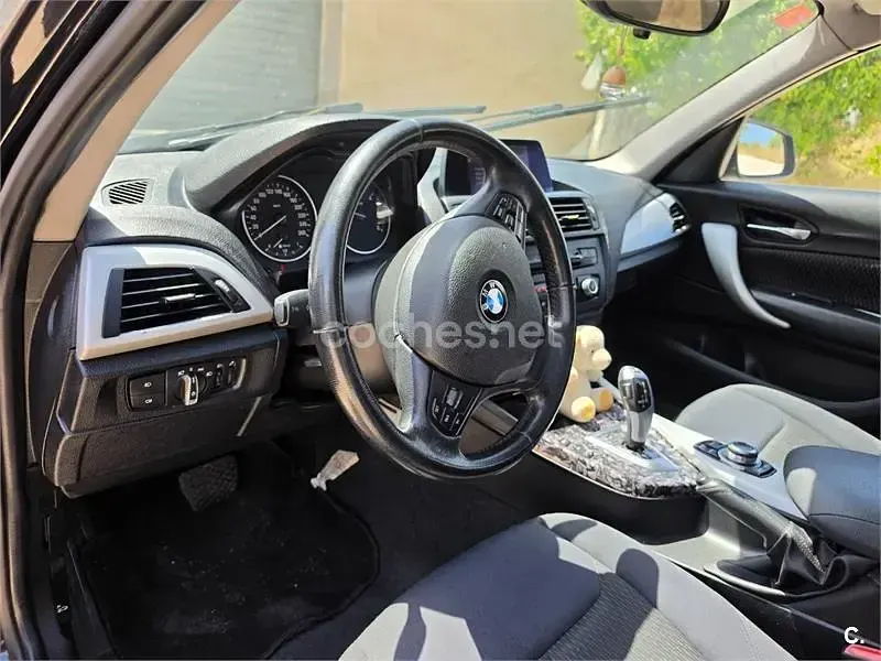 Usado BMW 116 115 CV (84 kW) 2012 Negro Utilitario