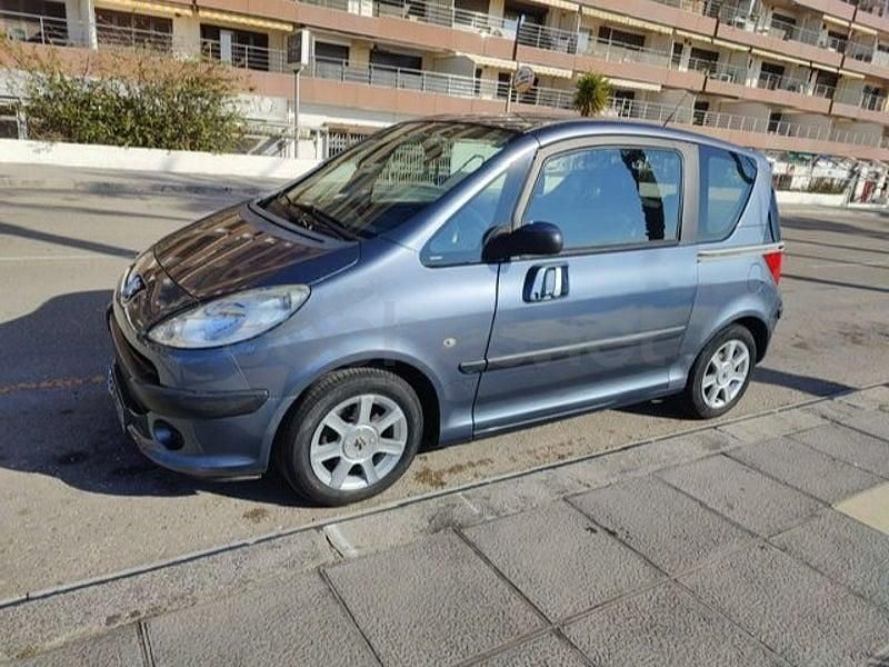 Usado Peugeot 1007 75 CV (55 kW) 2005 Gris / plata Monovolumen