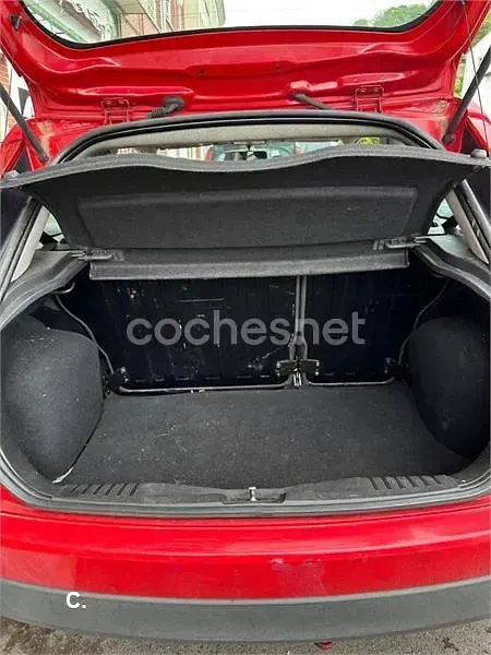 Używany Ford Fiesta Ambiente 68 KM (50 kW) 2008 Czerwony Hatchback