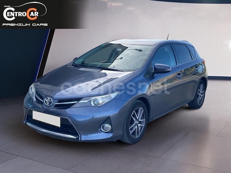 Usado Toyota Auris 124 CV (91 kW) 2014 Gris / plata Berlina