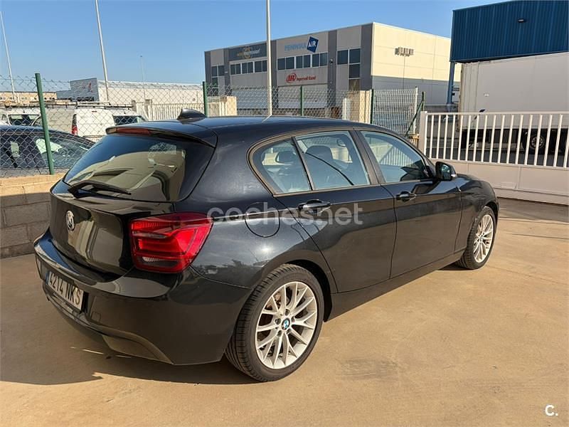 Usado BMW 118 Sport Line 170 CV (125 kW) 2011 Negro Utilitario