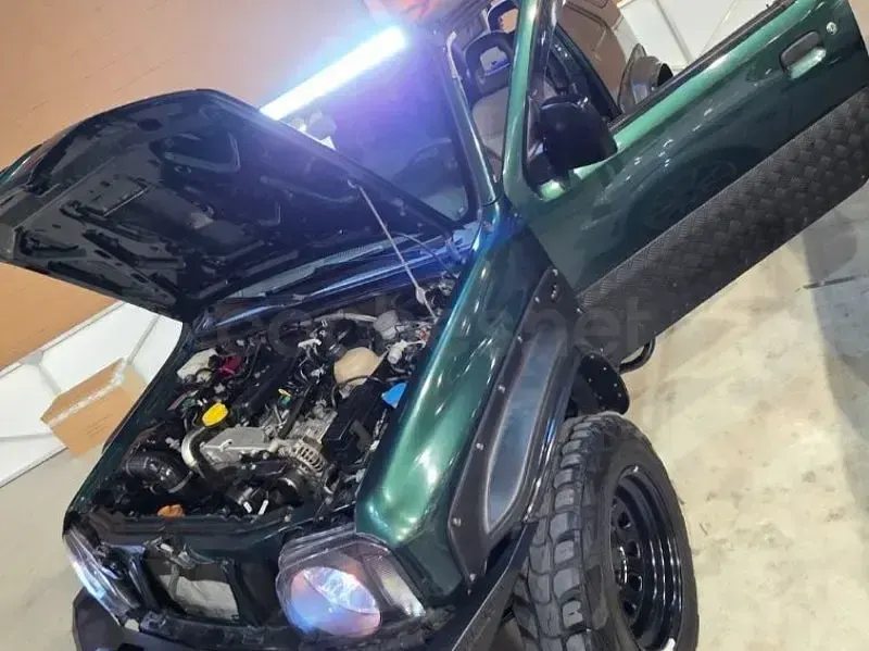 Usado Suzuki Jimny 65 CV (47 kW) 2004 Verde SUV