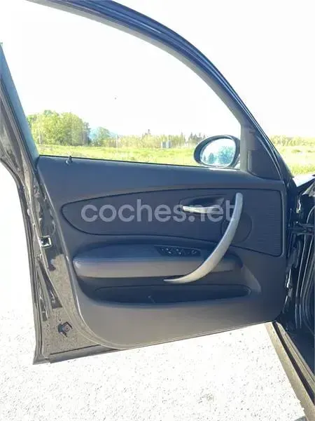 Usado BMW 118 122 CV (89 kW) 2007 Negro Utilitario