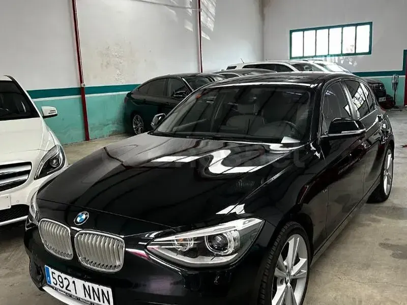 Usado BMW 118 170 CV (125 kW) 2011 Negro Utilitario