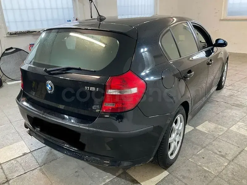 Usado BMW 116 122 CV (89 kW) 2008 Negro Utilitario