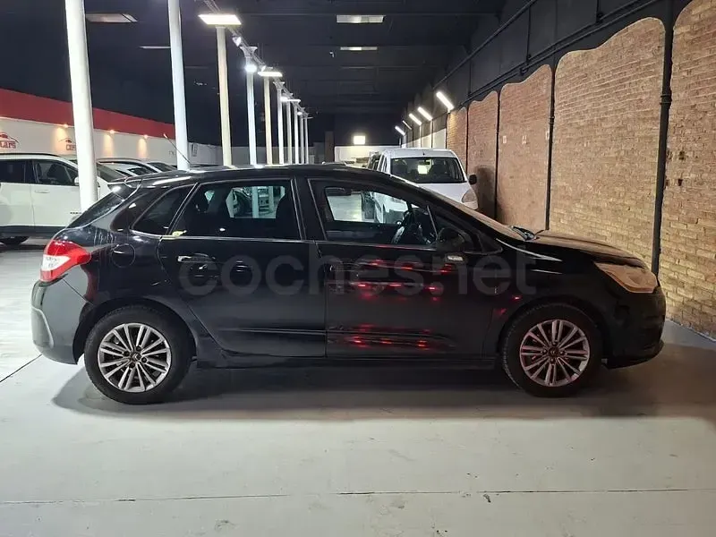 Usado Citroën C4 114 CV (83 kW) 2013 Negro Berlina