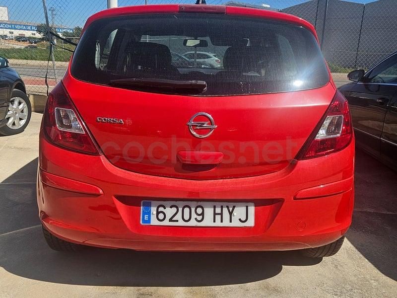 Usado Opel Corsa Selective 85 CV (62 kW) 2014 Rojo Utilitario