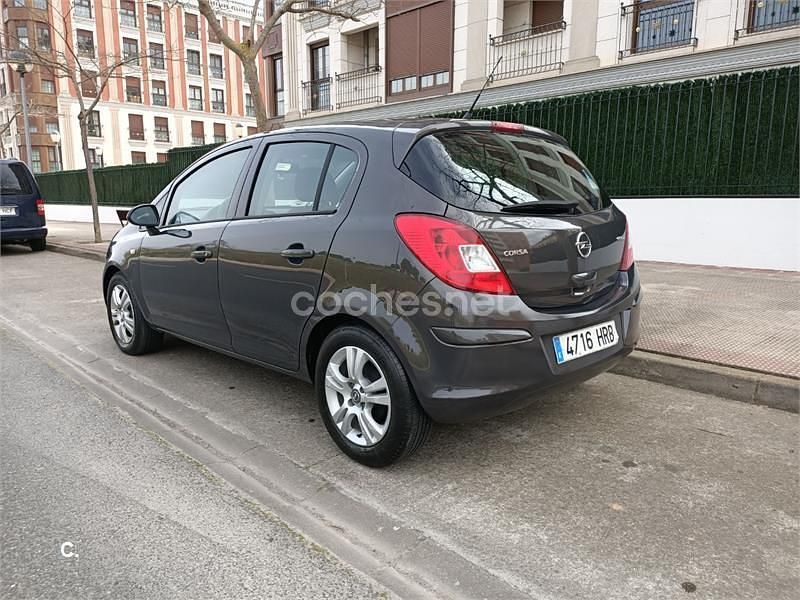 Usado Opel Corsa Selective 75 CV (55 kW) 2013 Marrón Utilitario