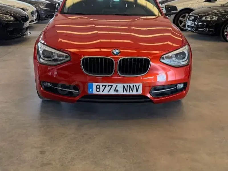 Usado BMW 116 Sport Line 136 CV (100 kW) 2012 Naranja Utilitario