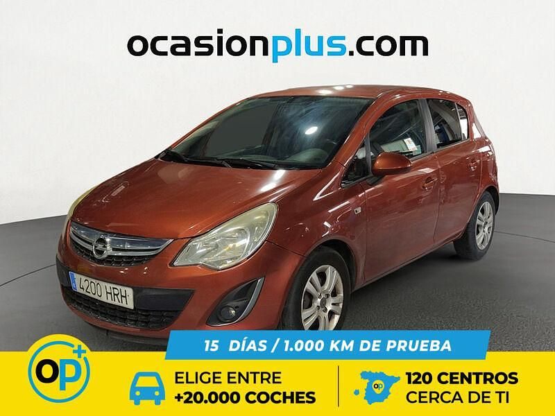 Usado Opel Corsa Expression 86 CV (63 kW) 2013 Naranja Utilitario