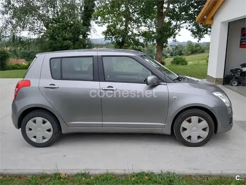 Usado Suzuki Swift GL 92 CV (67 kW) 2009 Gris / plata Utilitario