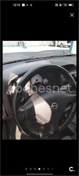 Używany Opel Astra Sport 100 KM (73 kW) 2003 Czarny Sedan/Limuzyna