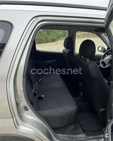 Usado Suzuki Ignis 99 CV (72 kW) 2004 Gris / plata Utilitario