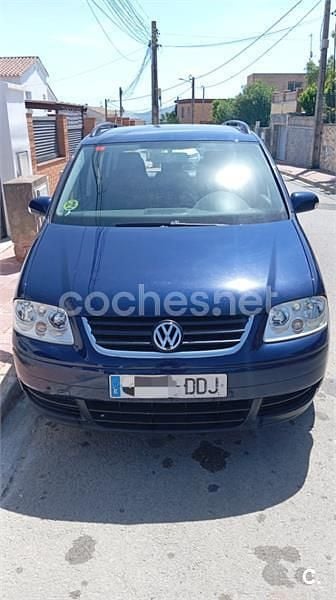 Usado VW Touran Conceptline 100 CV (73 kW) 2004 Azul Monovolumen