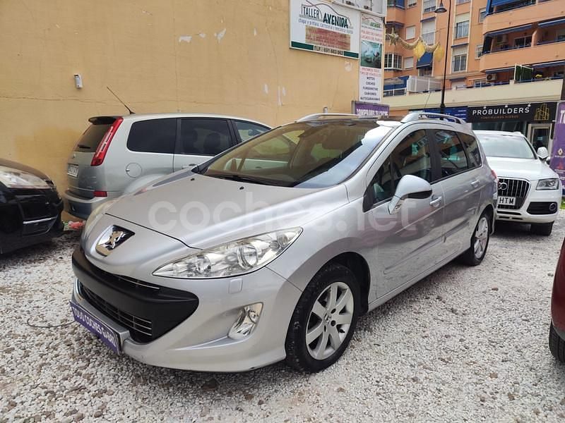 Gris / plata Usado 2010 Peugeot 308 SW Premium Familiar | 4990 € (Precio justo) - Imagen 1/4