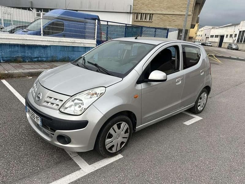Usado Nissan Pixo Visia 68 CV (50 kW) 2011 Gris Utilitario