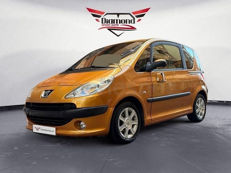 Usado Peugeot 1007 75 CV (55 kW) 2006 Naranja Monovolumen