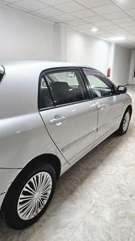 Käytetty Toyota Corolla 97 HP (71 kW) 2003 Harmaa Viistoperä