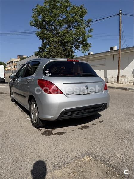 Usado Peugeot 308 Business-Line 92 HP (67 kW) 2012 Cinzento Sedan