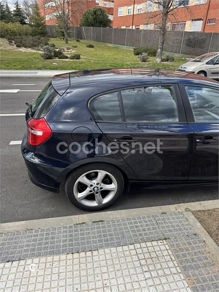 Usado BMW 116 122 CV (89 kW) 2009 Negro Utilitario