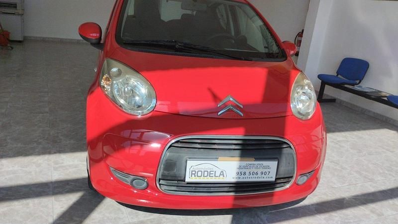 Usado Citroën C1 68 CV (50 kW) 2009 Rojo Utilitario