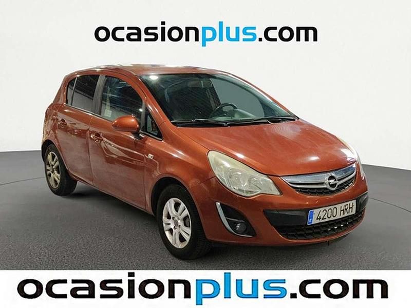 Usado Opel Corsa Expression 86 CV (63 kW) 2013 Naranja Utilitario
