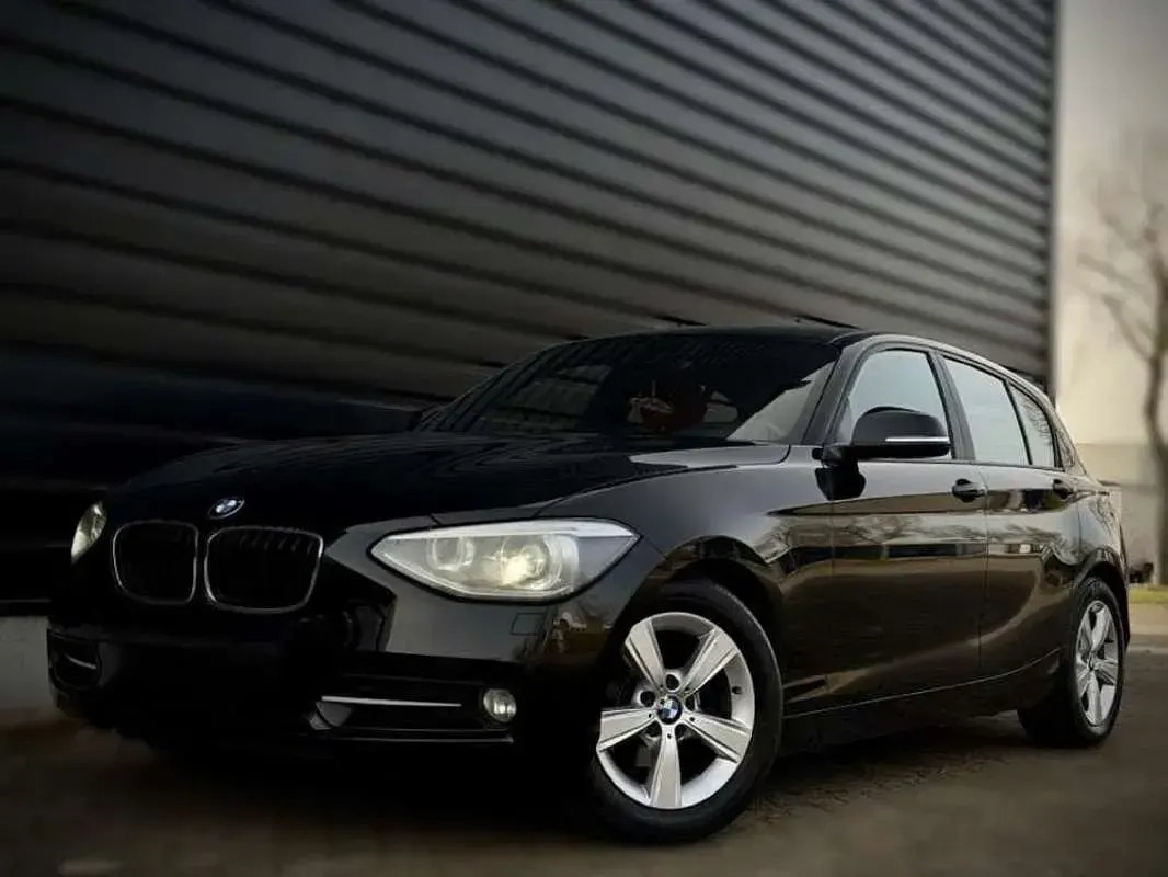 Usado BMW 116 Sport Line 136 CV (100 kW) 2013 Negro Utilitario