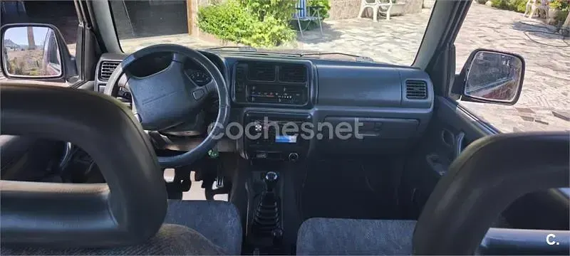 Usado Suzuki Jimny 80 CV (58 kW) 1999 Granate SUV
