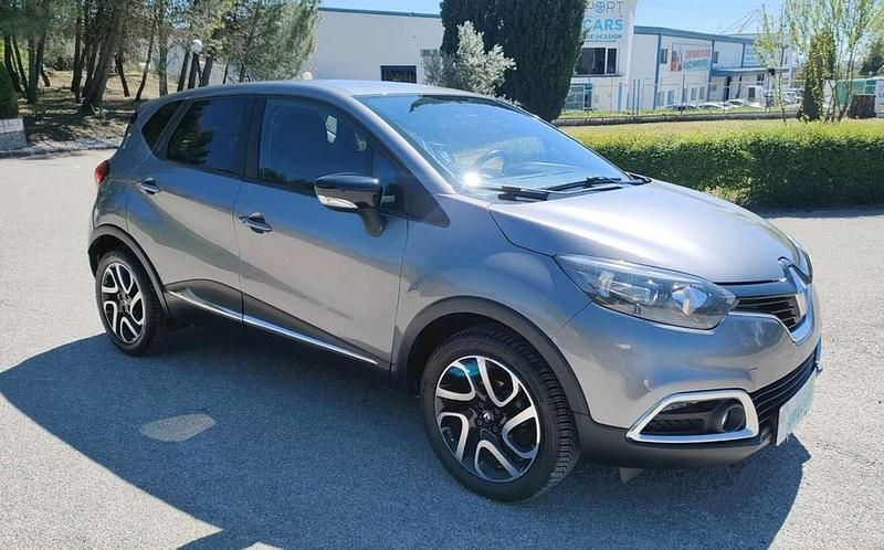 Usado Renault Captur Intens 90 HP (66 kW) 2015 Cinzento SUV