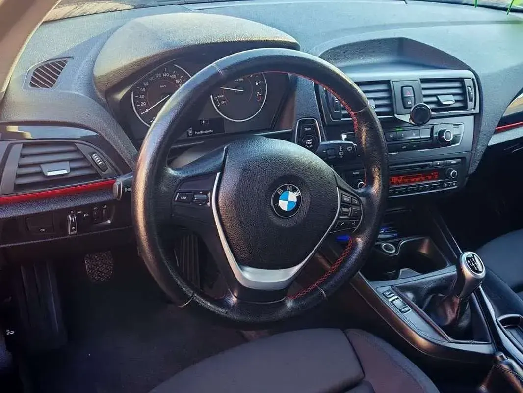 Usado BMW 114 102 CV (75 kW) 2012 Rojo Utilitario