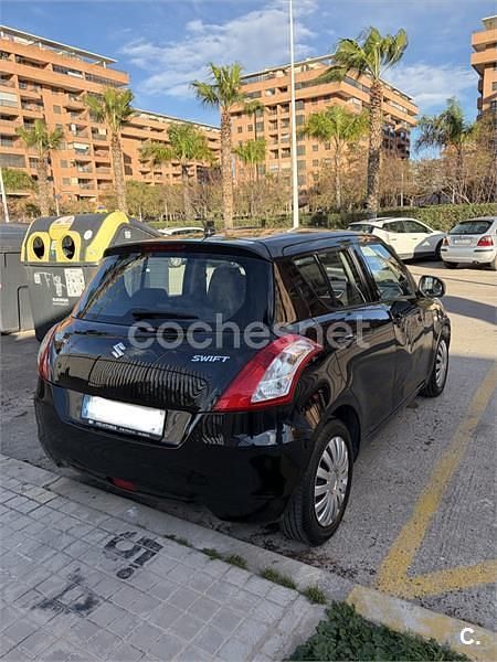 Usado Suzuki Swift GL 95 CV (69 kW) 2011 Negro Berlina