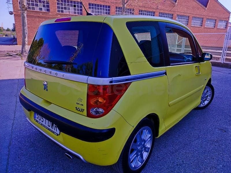Usado Peugeot 1007 70 CV (51 kW) 2006 Amarillo Monovolumen
