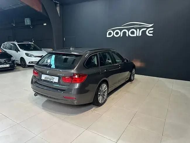 Używany BMW 318 143 KM (105 kW) 2014 Brązowy Sedan/Limuzyna