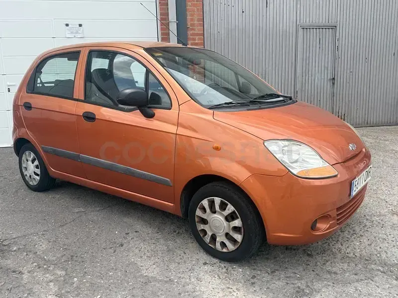 Usado Chevrolet Matiz 65 CV (47 kW) 2005 Naranja Utilitario