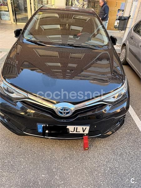 Usado Toyota Auris Hybrid Advance 136 CV (100 kW) 2016 Negro Berlina