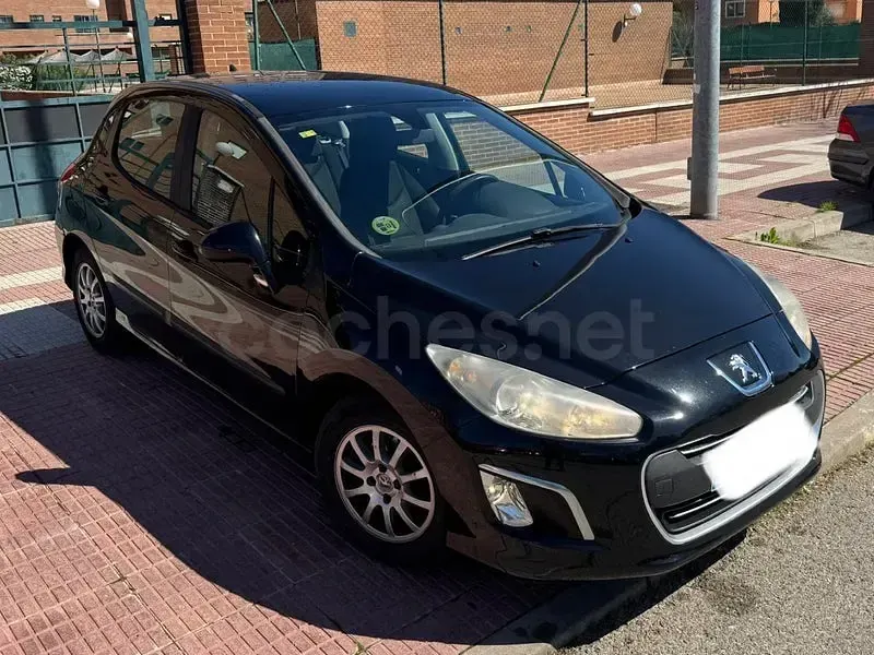 Usado Peugeot 308 Access 92 CV (67 kW) 2012 Negro Berlina