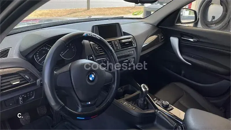 Usado BMW 116 122 CV (89 kW) 2012 Negro Utilitario