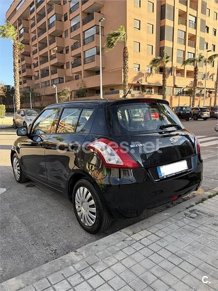 Usado Suzuki Swift GL 95 CV (69 kW) 2011 Negro Berlina