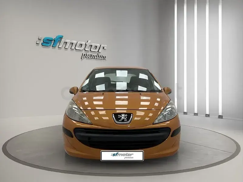 Usado Peugeot 207 75 CV (55 kW) 2007 Naranja Berlina