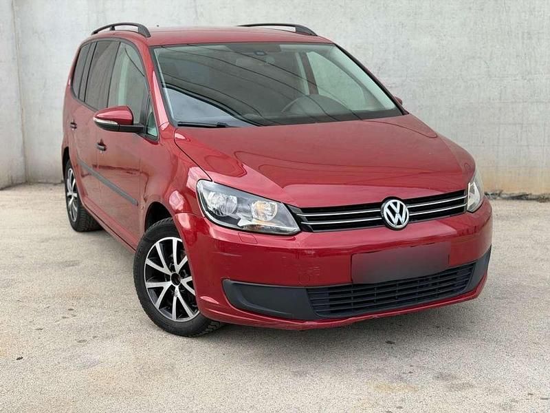 Usado VW Touran Business 105 CV (77 kW) 2014 Rojo Monovolumen