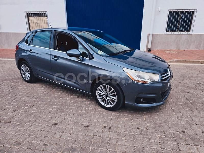 Gris / plata Usado 2013 Citroën C4 Seduction Berlina | 5499 € (Super precio) - Imagen 1/4