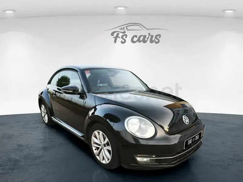 Usado VW Beetle Design 105 CV (77 kW) 2012 Negro Utilitario